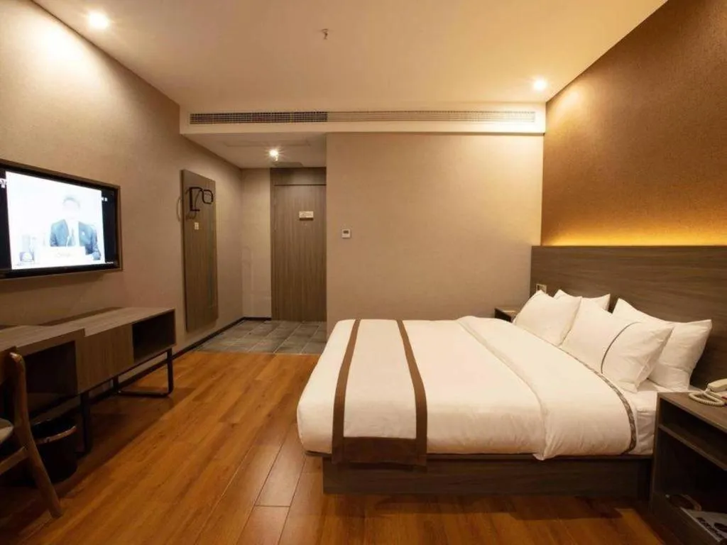 Bed in Jtour Inn Wuxi Meiyuan Kaiyuan Temple Metro