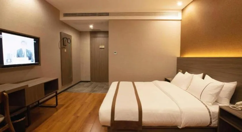 Bed in Jtour Inn Wuxi Meiyuan Kaiyuan Temple Metro