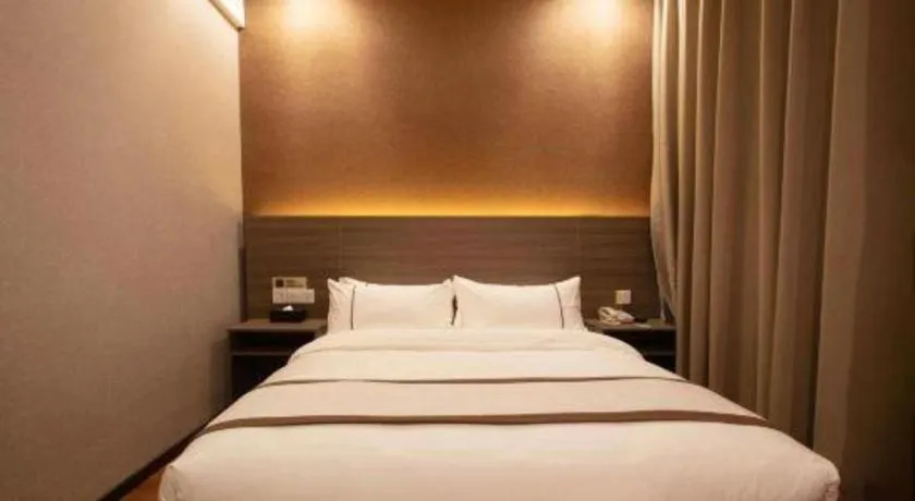 Bed in Jtour Inn Wuxi Meiyuan Kaiyuan Temple Metro