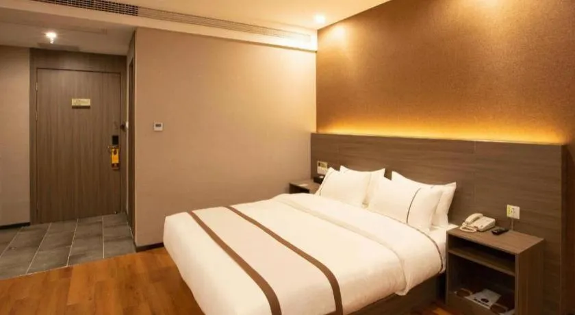 Bed in Jtour Inn Wuxi Meiyuan Kaiyuan Temple Metro