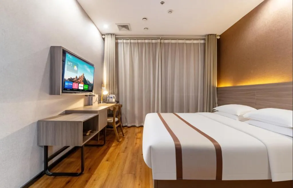 Bed in Jtour Inn Wuxi Meiyuan Kaiyuan Temple Metro