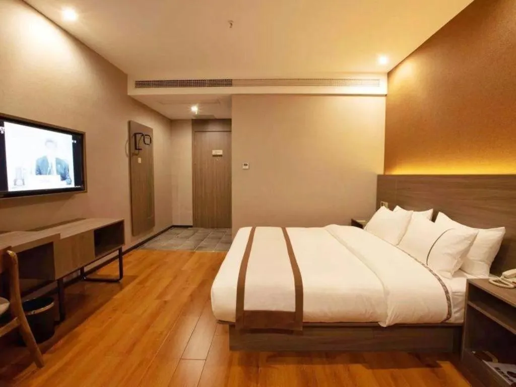 Bed in Jtour Inn Wuxi Meiyuan Kaiyuan Temple Metro