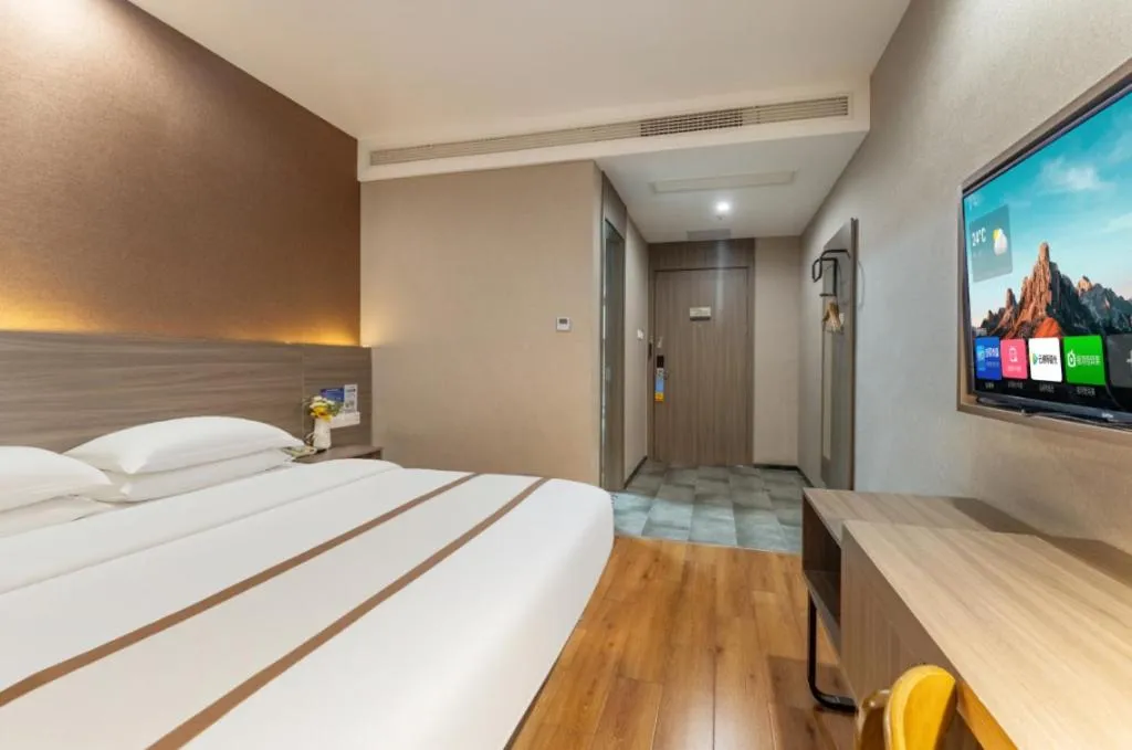 Bed in Jtour Inn Wuxi Meiyuan Kaiyuan Temple Metro