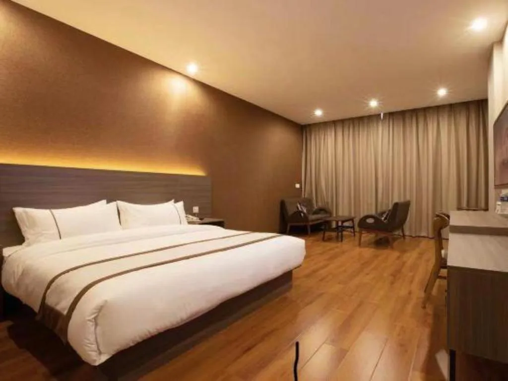 Bed in Jtour Inn Wuxi Meiyuan Kaiyuan Temple Metro