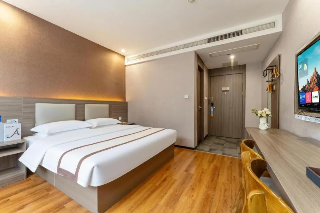 Bed in Jtour Inn Wuxi Meiyuan Kaiyuan Temple Metro