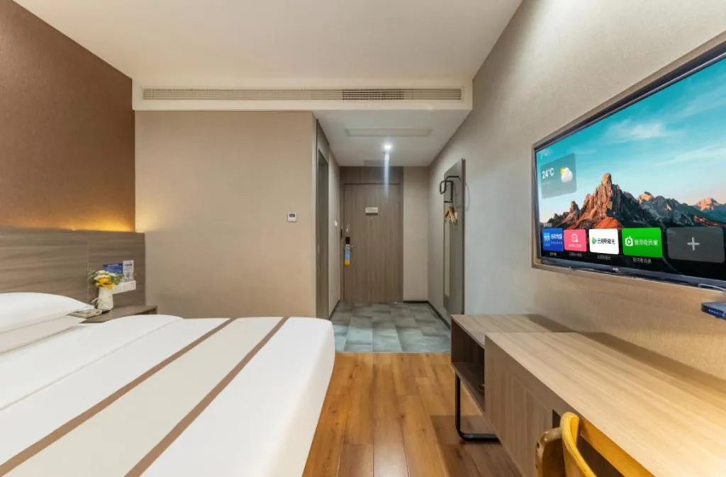 Bed in Jtour Inn Wuxi Meiyuan Kaiyuan Temple Metro