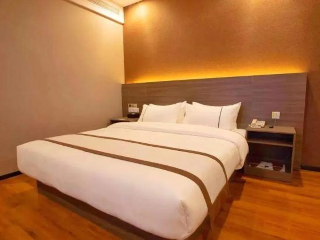 Bed in Jtour Inn Wuxi Meiyuan Kaiyuan Temple Metro