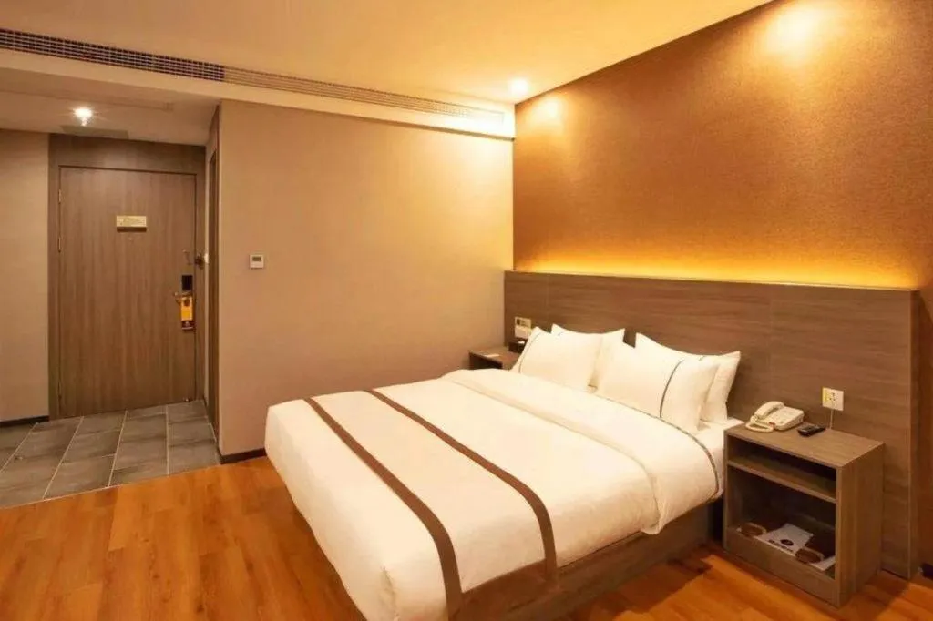 Bed in Jtour Inn Wuxi Meiyuan Kaiyuan Temple Metro