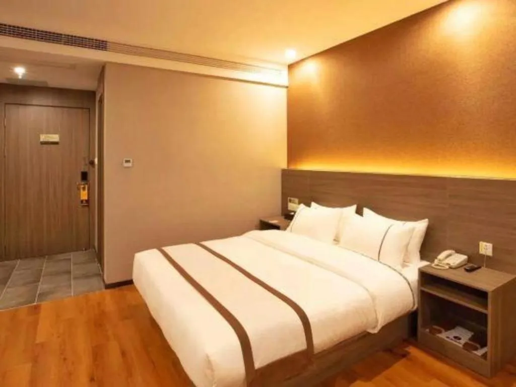 Bed in Jtour Inn Wuxi Meiyuan Kaiyuan Temple Metro