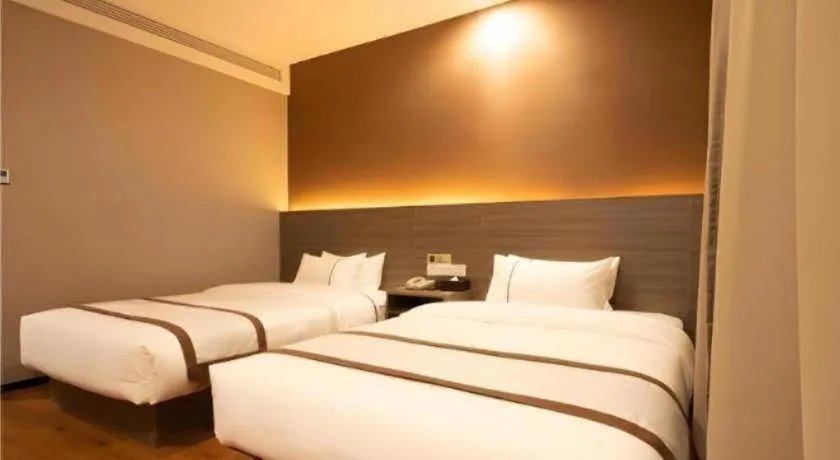 Bed in Jtour Inn Wuxi Meiyuan Kaiyuan Temple Metro