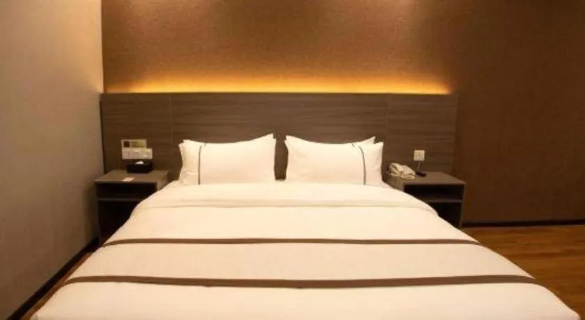 Bed in Jtour Inn Wuxi Meiyuan Kaiyuan Temple Metro