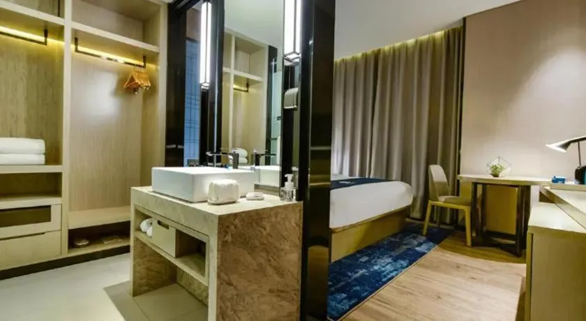 Bed in Echarm Hotel Guiyang Longdongbao International Airport Outlets