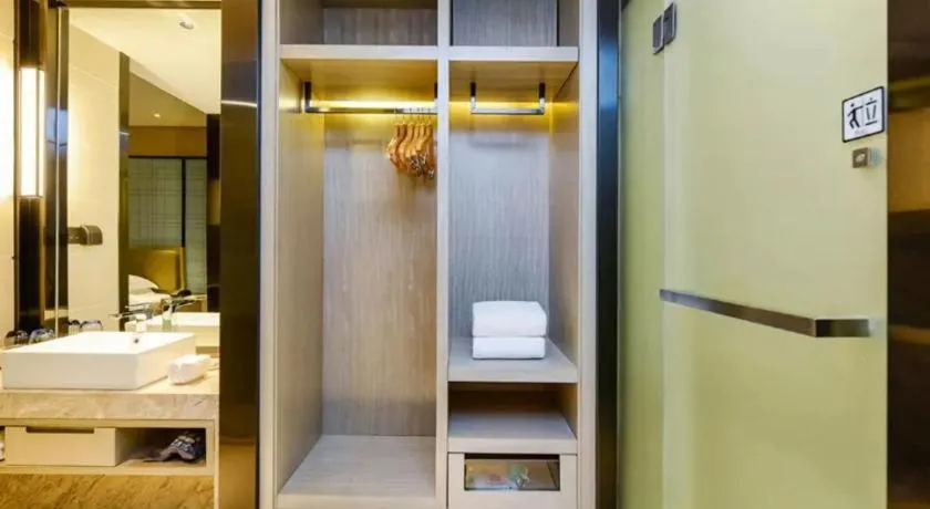 Bed in Echarm Hotel Guiyang Longdongbao International Airport Outlets