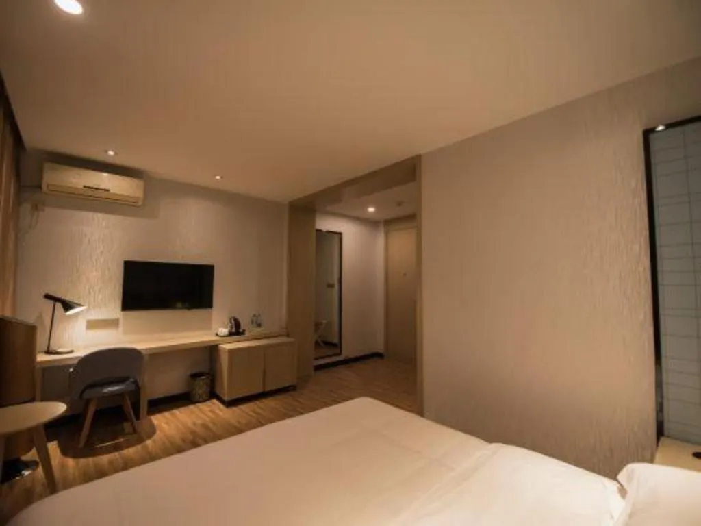 Bed in Borrman Hotel Hefei Guogou Plaza Sanli'an Metro Station