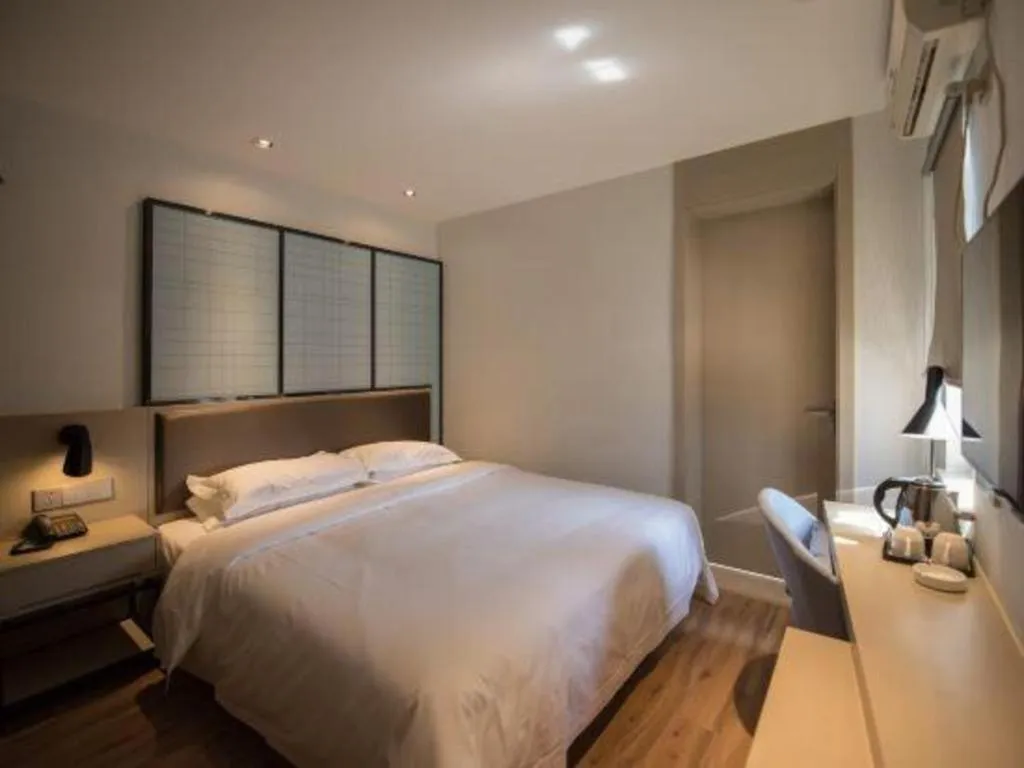 Bed in Borrman Hotel Hefei Guogou Plaza Sanli'an Metro Station