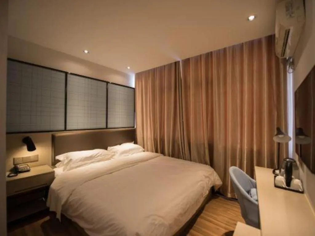 Bed in Borrman Hotel Hefei Guogou Plaza Sanli'an Metro Station