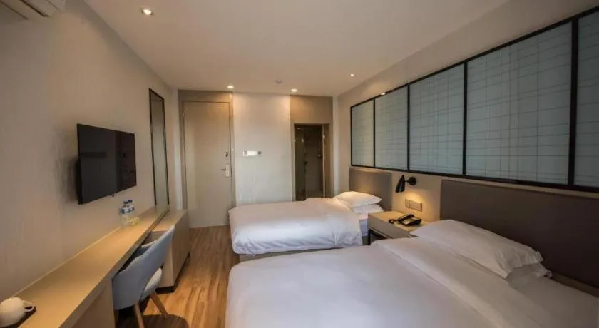 Bed in Borrman Hotel Hefei Guogou Plaza Sanli'an Metro Station