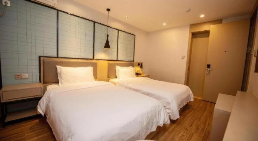 Bed in Borrman Hotel Hefei Guogou Plaza Sanli'an Metro Station