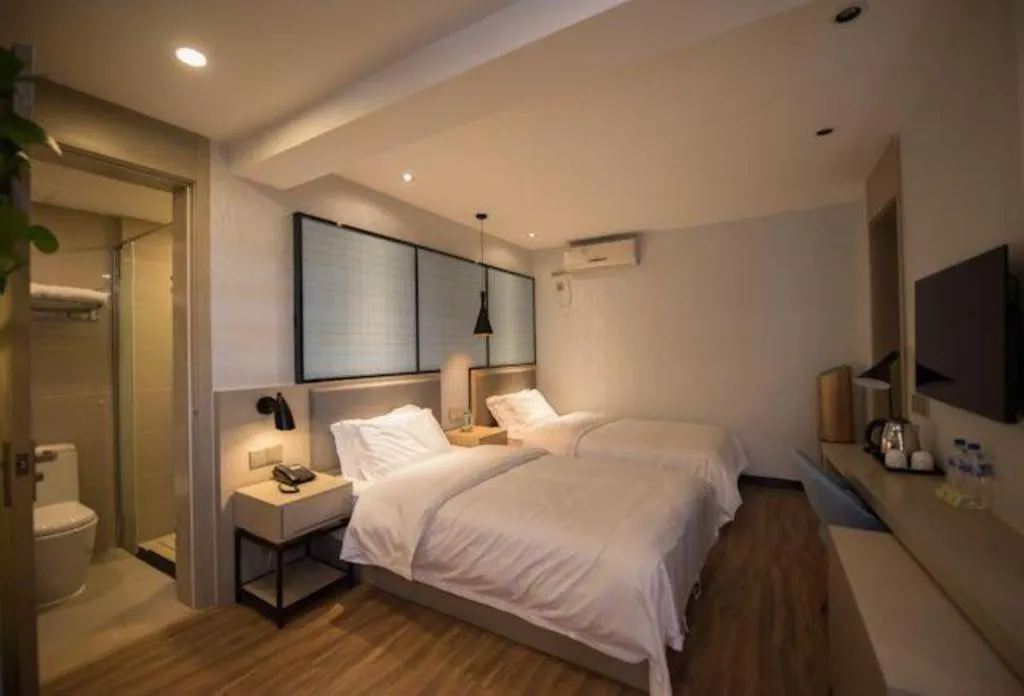 Bed in Borrman Hotel Hefei Guogou Plaza Sanli'an Metro Station