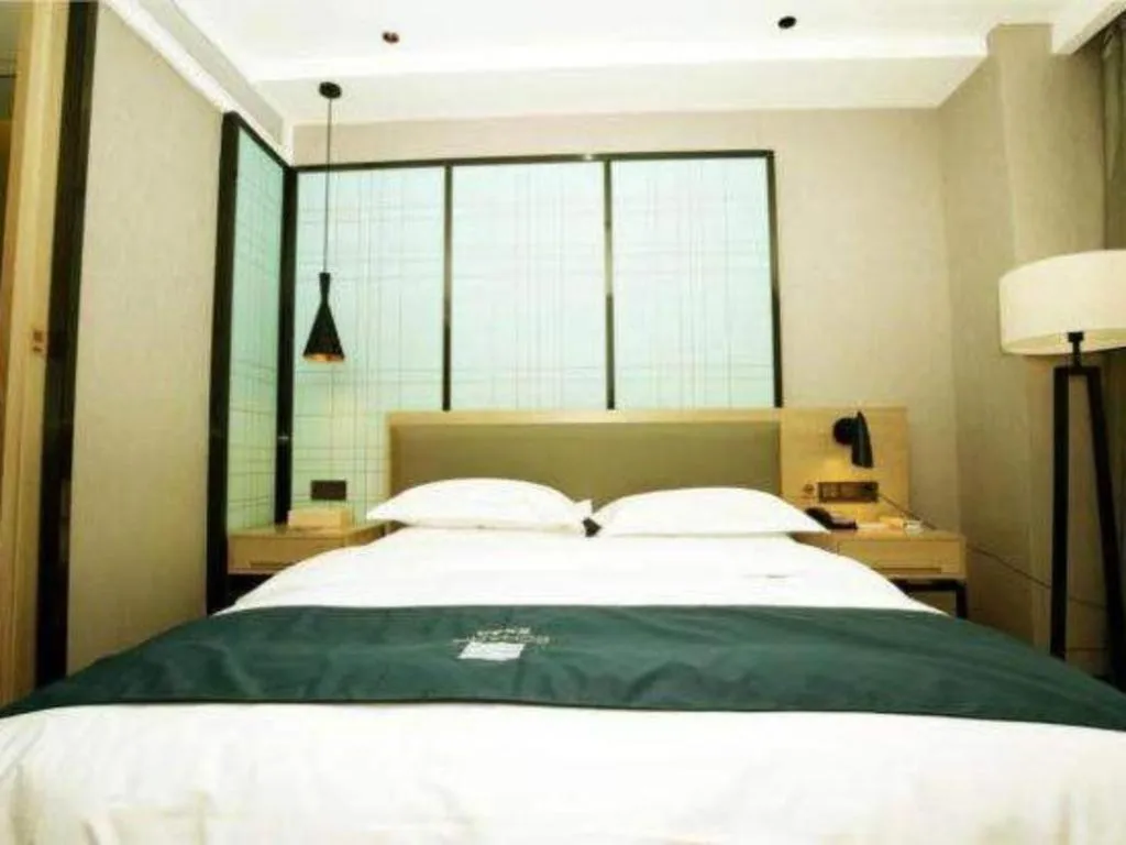 Bed in Borrman Hotel Hefei Guogou Plaza Sanli'an Metro Station