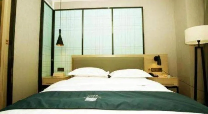 Bed in Borrman Hotel Hefei Guogou Plaza Sanli'an Metro Station