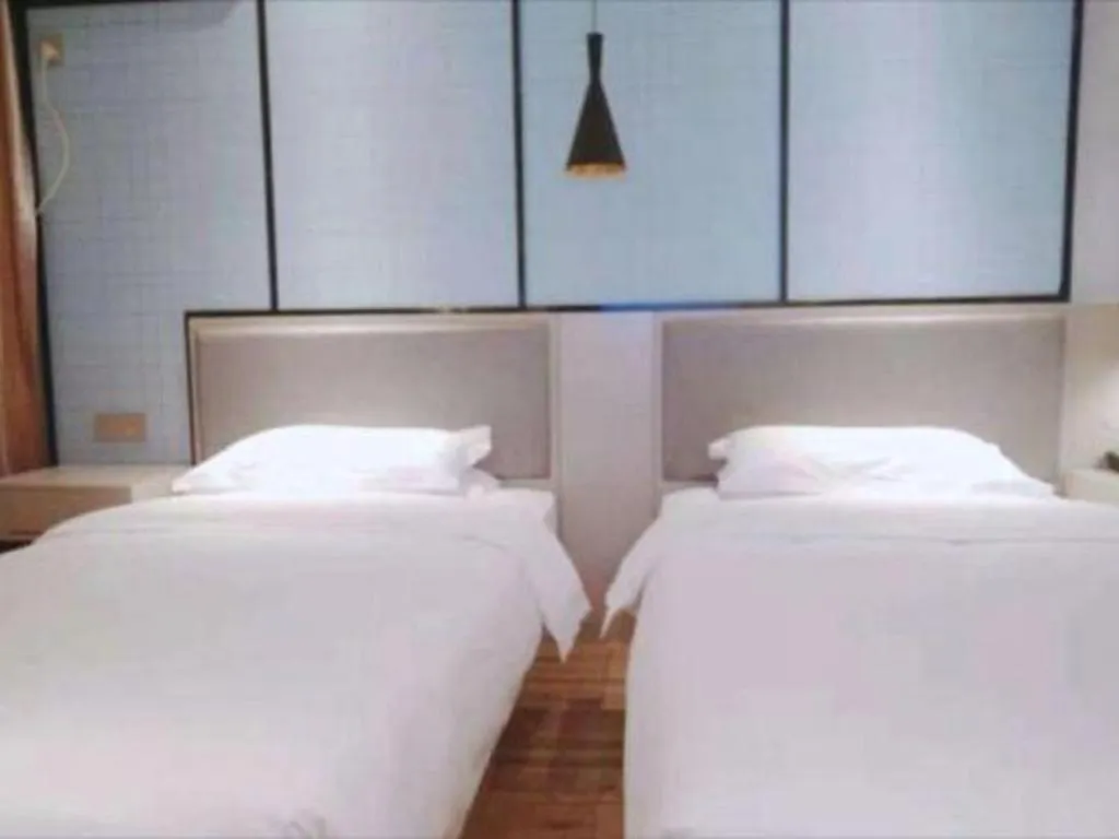 Bed in Borrman Hotel Hefei Guogou Plaza Sanli'an Metro Station