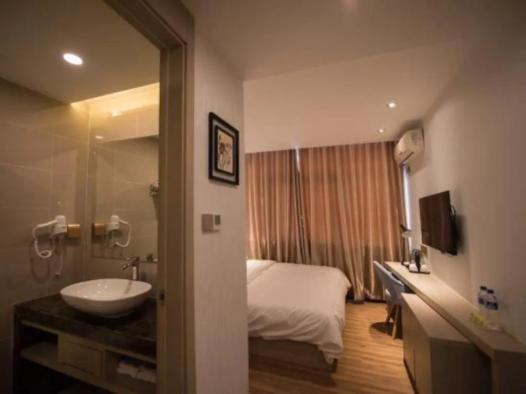 Bed in Borrman Hotel Hefei Guogou Plaza Sanli'an Metro Station