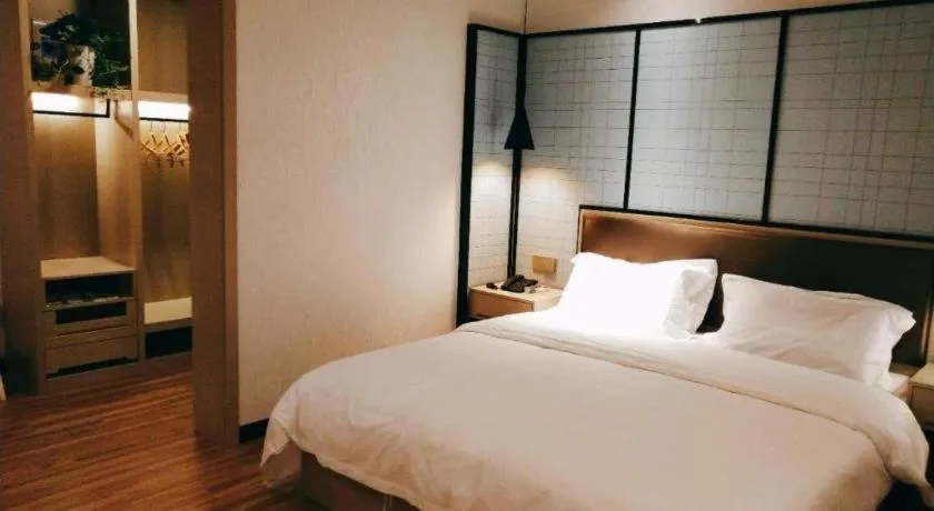 Bed in Borrman Hotel Hefei Guogou Plaza Sanli'an Metro Station