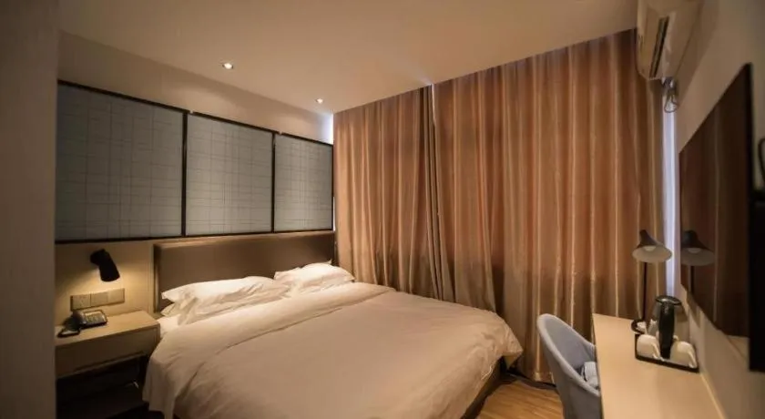 Bed in Borrman Hotel Hefei Guogou Plaza Sanli'an Metro Station