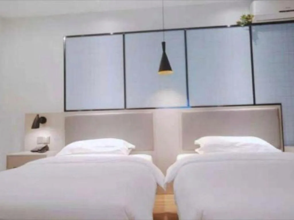 Bed in Borrman Hotel Hefei Guogou Plaza Sanli'an Metro Station