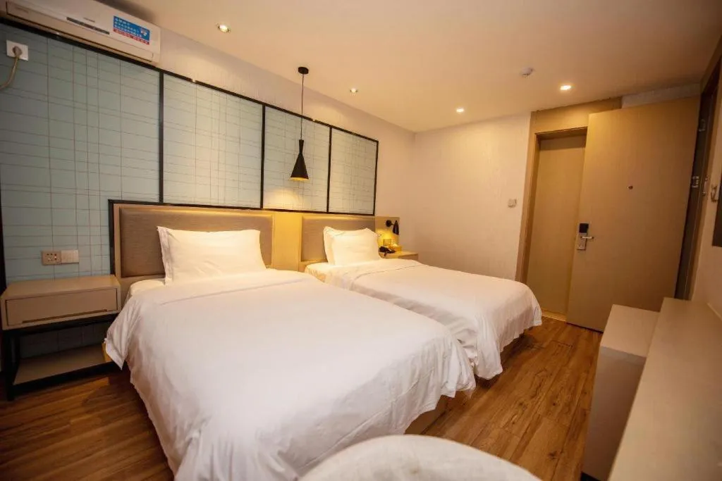 Bed in Borrman Hotel Hefei Guogou Plaza Sanli'an Metro Station