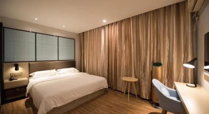 Bed in Borrman Hotel Hefei Guogou Plaza Sanli'an Metro Station