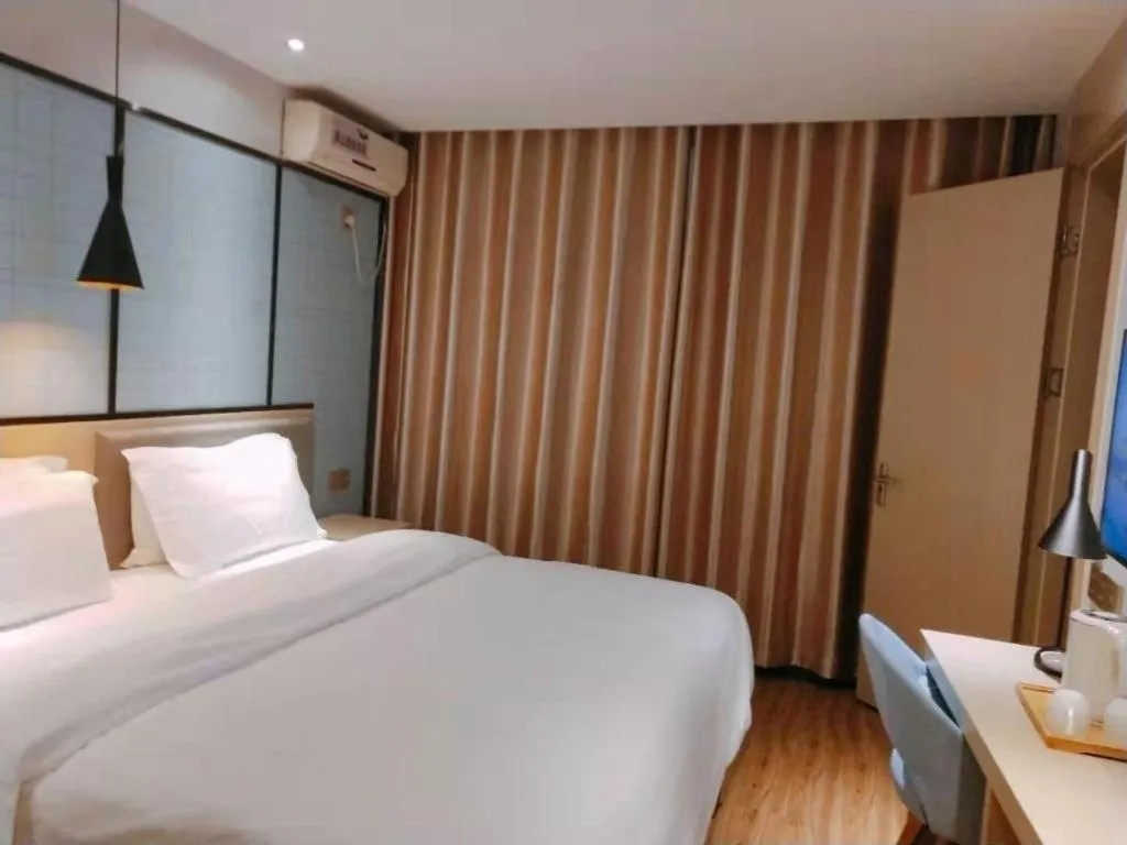 Bed in Borrman Hotel Hefei Guogou Plaza Sanli'an Metro Station