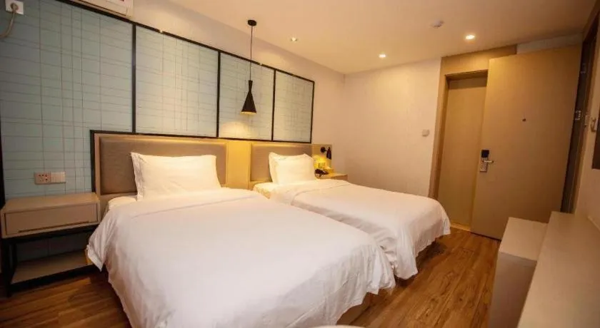 Bed in Borrman Hotel Hefei Guogou Plaza Sanli'an Metro Station