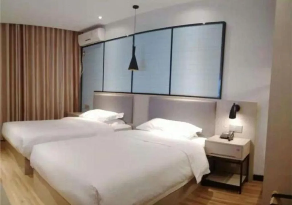 Bed in Borrman Hotel Hefei Guogou Plaza Sanli'an Metro Station