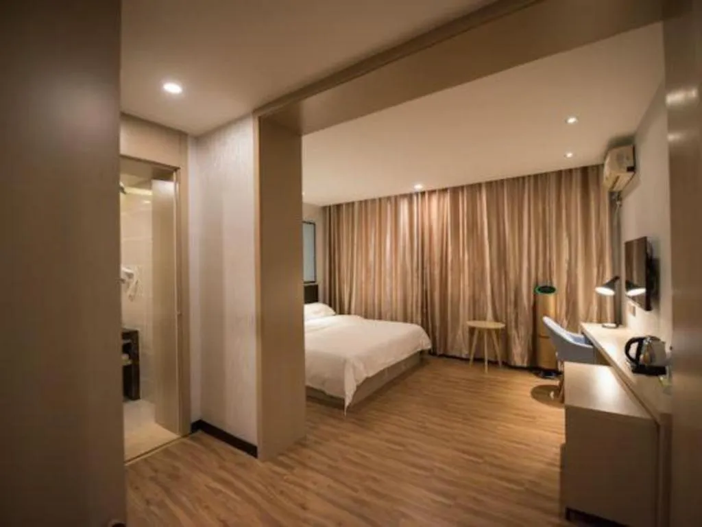 Bed in Borrman Hotel Hefei Guogou Plaza Sanli'an Metro Station