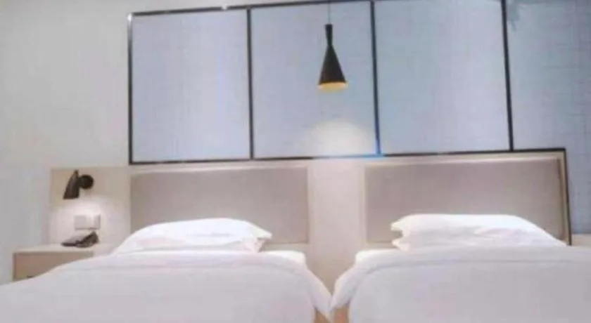 Bed in Borrman Hotel Hefei Guogou Plaza Sanli'an Metro Station