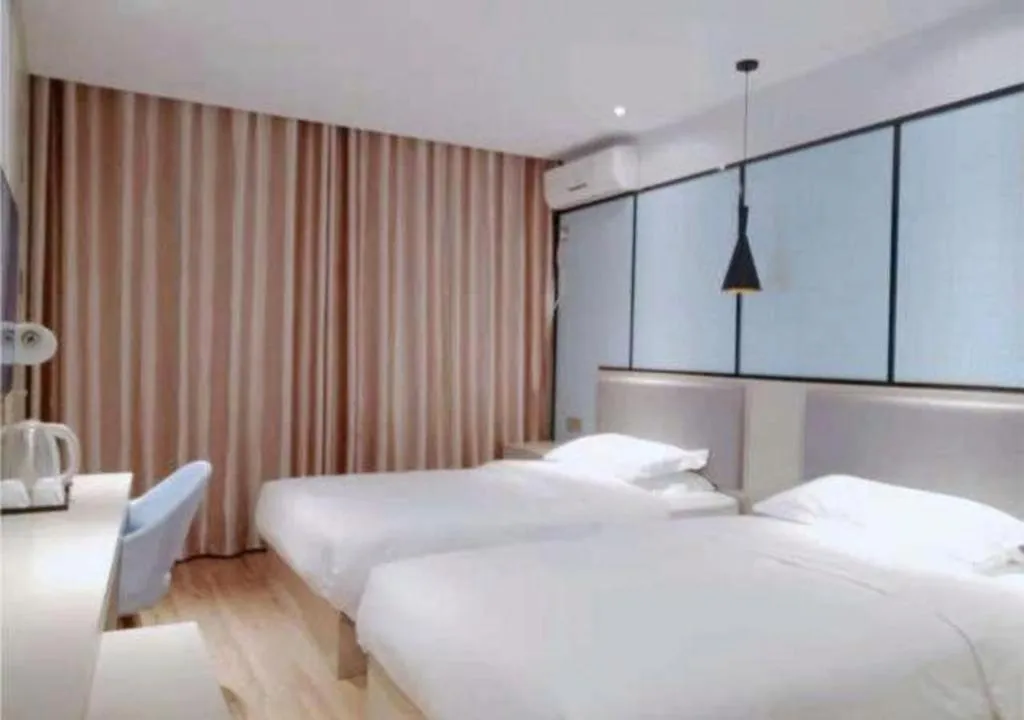 Bed in Borrman Hotel Hefei Guogou Plaza Sanli'an Metro Station