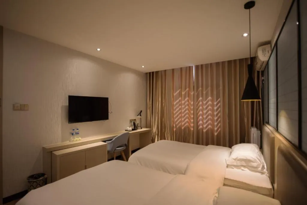 Bed in Borrman Hotel Hefei Guogou Plaza Sanli'an Metro Station