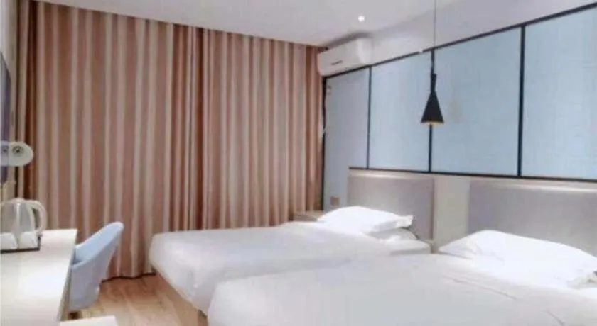 Bed in Borrman Hotel Hefei Guogou Plaza Sanli'an Metro Station