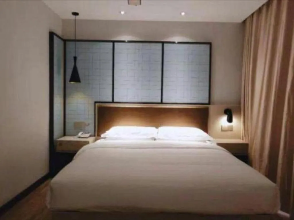 Bed in Borrman Hotel Hefei Guogou Plaza Sanli'an Metro Station