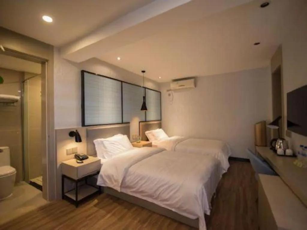 Bed in Borrman Hotel Hefei Guogou Plaza Sanli'an Metro Station