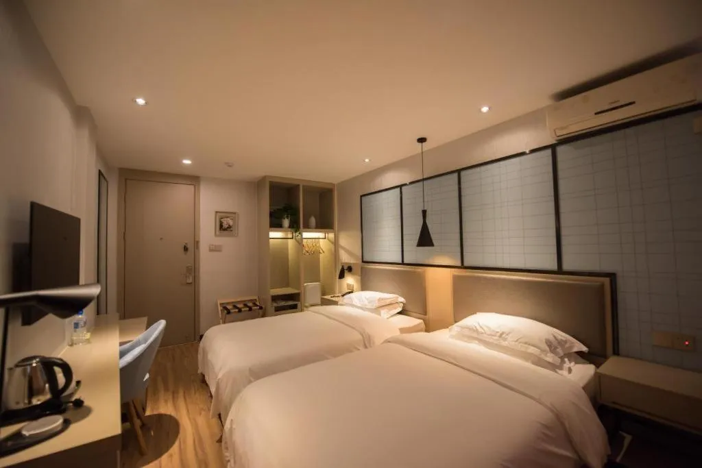 Bed in Borrman Hotel Hefei Guogou Plaza Sanli'an Metro Station