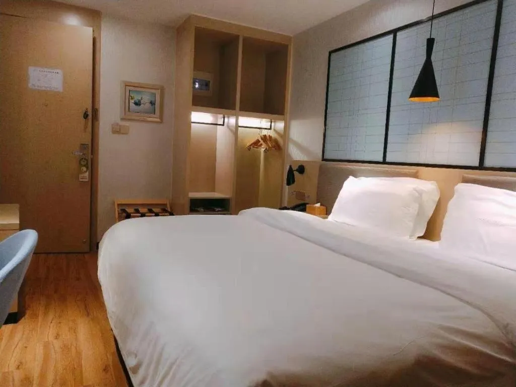 Bed in Borrman Hotel Hefei Guogou Plaza Sanli'an Metro Station