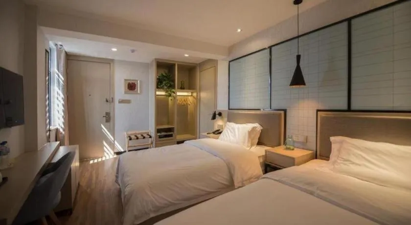 Bed in Borrman Hotel Hefei Guogou Plaza Sanli'an Metro Station