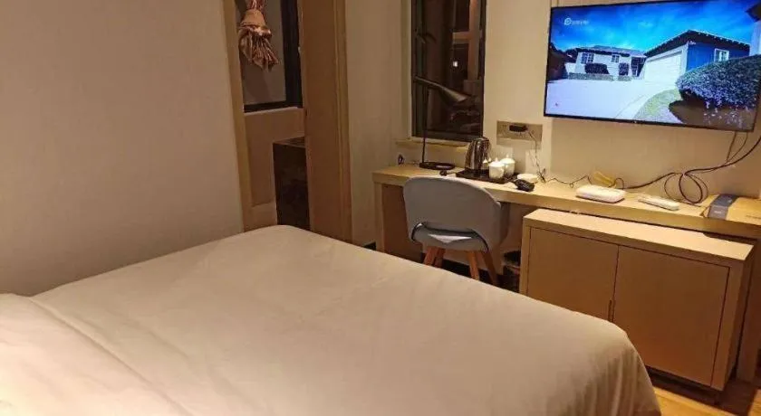 Bed in Borrman Hotel Hefei Guogou Plaza Sanli'an Metro Station