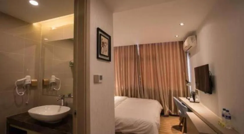 Bed in Borrman Hotel Hefei Guogou Plaza Sanli'an Metro Station