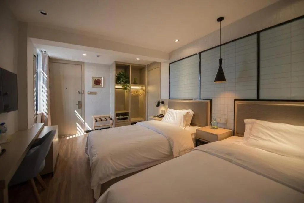 Bed in Borrman Hotel Hefei Guogou Plaza Sanli'an Metro Station