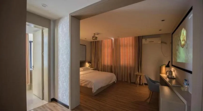 Bed in Borrman Hotel Hefei Guogou Plaza Sanli'an Metro Station