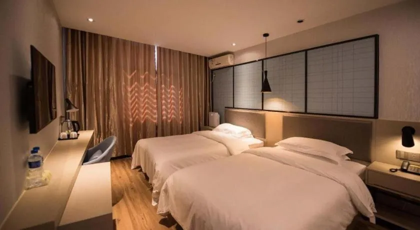 Bed in Borrman Hotel Hefei Guogou Plaza Sanli'an Metro Station